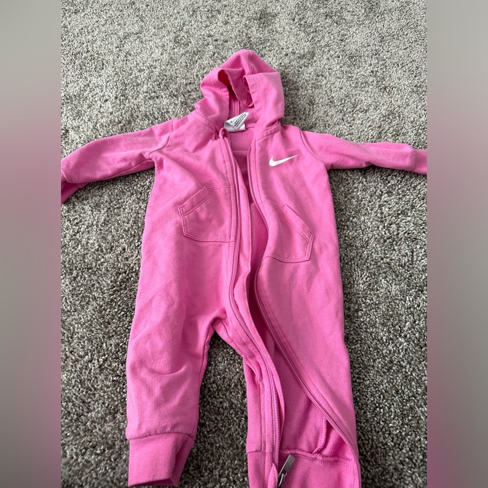 Nike Pink baby onesie